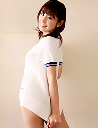 Awesome petite teen Asian Miu Nakamura seductively strips her T-shirt to pose in her blue underwear.