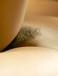 Short haired hottie bares it all in the kitchen.